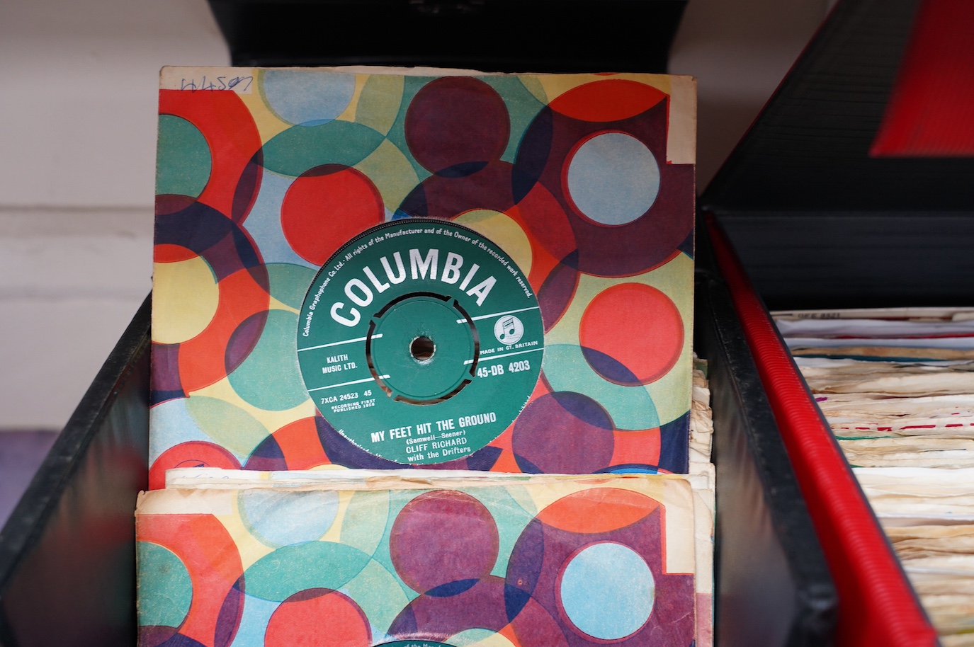 Four 7” single carry cases, containing singles on labels including; Brunswick, Decca, HMV, Pye, Columbia, etc. artists including; Bill Haley, Rod Stewart, David Bowie, Buddy Holly, Gene Vincent, Cliff Richard, Tommy Stee